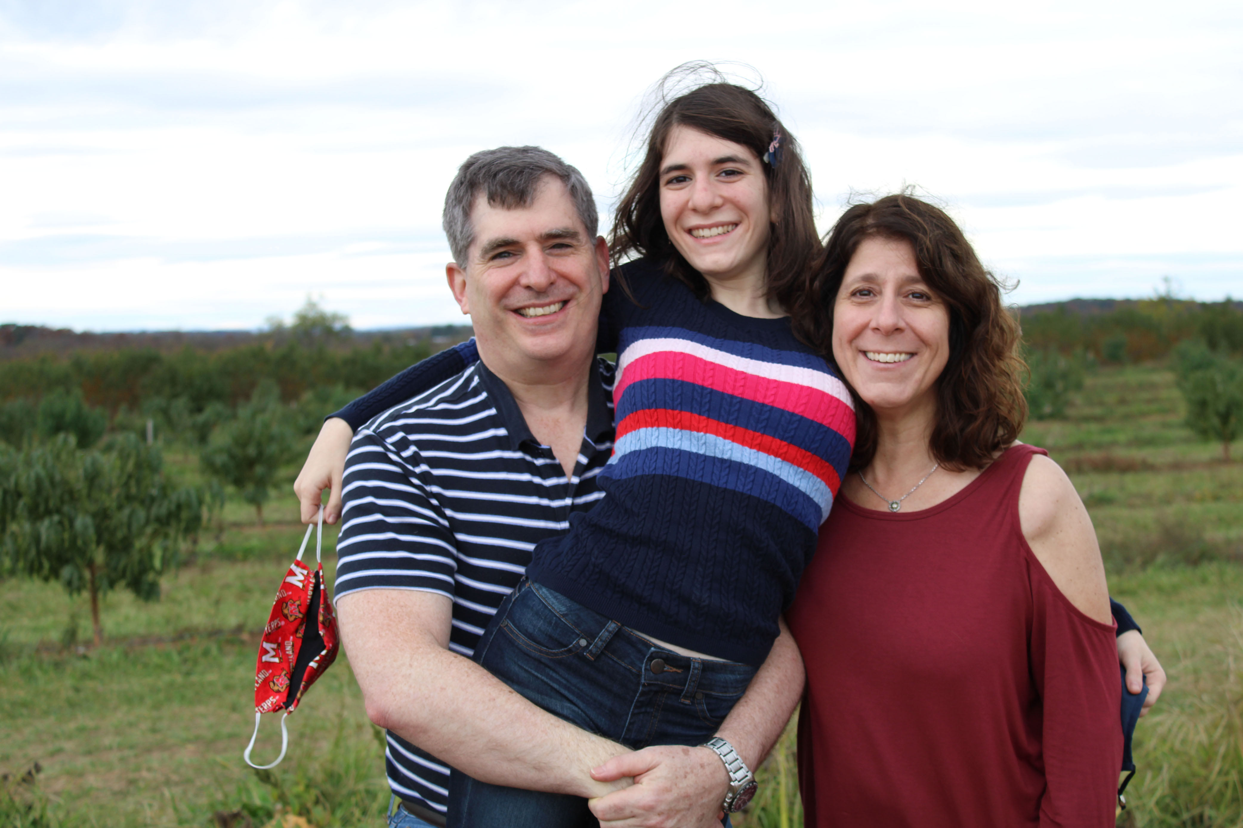 family at pumpkin patch